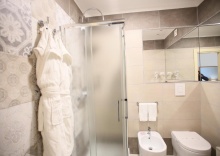 Трёхместный номер в Le Ginestre Family Wellness Hotel