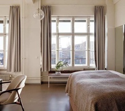 Номер Deluxe в Michelberger Hotel Berlin