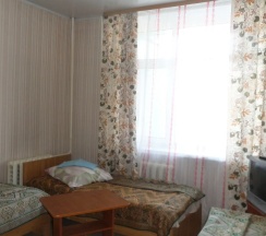 Кровать в общем номере (общая ванная комната) в Кировская