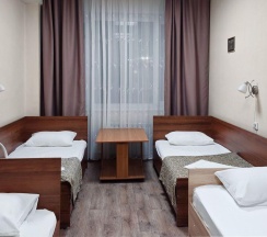 Кровать в 4-местном общем номере в Smart Hotel KDO Миасс