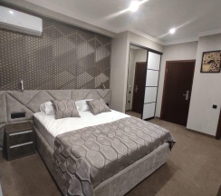 Номер делюкс семейный с 1 двуспальной кроватью №404 в Рествилль