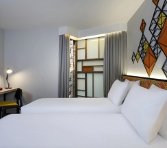 Двухместный номер Atrium View Premium 2 отдельные кровати в ibis Styles Bangkok Silom