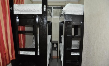 Кровать в общем номере в Swiss Hostel