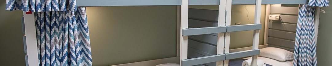 Кровать в женском номере с 4 кроватями в Рус-Арена