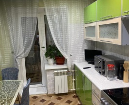 Двухместные апартаменты с 2 комнатами с балконом (двуспальная кровать) в Квартира Фурманова 17
