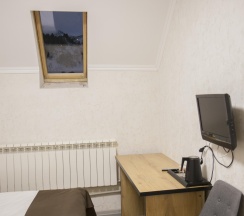 Номер стандарт с 2 односпальными кроватями (мансарда) в Альпина