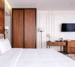 Двухместный люкс с видом на горы двуспальная кровать в GRAND MILDOM HOTEL