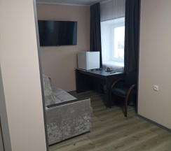 Номер комфорт полулюкс с 1 двуспальной кроватью в Ковров