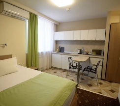 Улучшенный номер с кухней и двуспальной кроватью в Time hotel