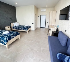 Комфорт с видом на море и террасой (twin+Extra Bed) в Costa d`Ora