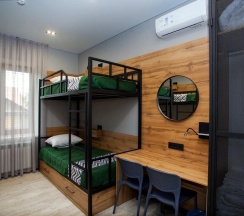 Кровать в общем номере с 3 двухъярусными кроватями (общие удобства) в Сириус