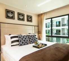 Люкс c 1 комнатой с видом на бассейн в The Title KR Beach Condotel Rawai Phuket