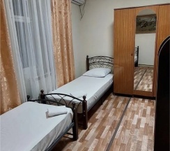 Четырехместный семейный номер в День-Ночь