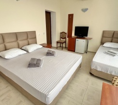 Четырёхместный номер Comfort рядом с пляжем в МореТут