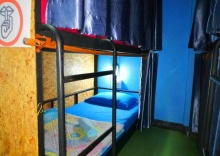 Кровать в общем номере с 6 комнатами в Chiang Mai Panda Hostel