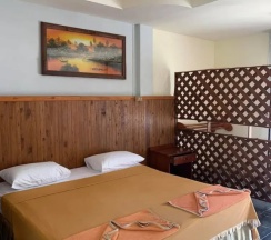 Двухместный номер Standard с балконом двуспальная кровать в Rattana Guesthouse & Bungalow
