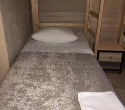 Кровать в 4-местном общем номере в Славянка