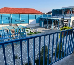 Двухуровневый ПОЛУЛЮКС с зоной отдыха на крыше и видом на бассейн в Santorini Family Club