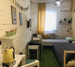 Уютный номер в стиле лофт в Neptunea