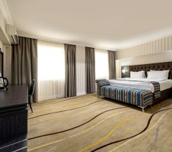 Двухместный номер Делюкс двуспальная кровать в Shymkent Grand Hotel