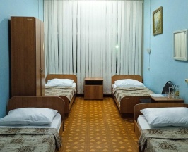 Кровать в 4-местном общем номере в Smart Hotel KDO Бузулук