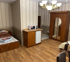 Четырёхместный номер Classic с красивым видом из окна в Дюна-центр