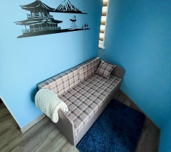 Номер люкс семейный с 1 односпальной и 1 двуспальной кроватью в Pallada