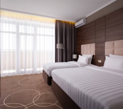 Номер Family Room Premium с двуспальной кроватью, односпальной кроватью и диваном в Movenpick Resort&SPA Anapa Miracleon