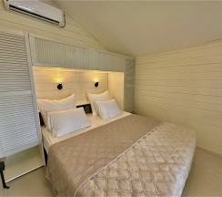 Стандартный семейный улучшенный четырёхместный номер в Жемчужина Абхазии