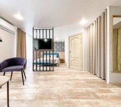 Стандарт семейный улучшенный с балконом в Volna Family Resort