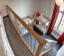 Кровать в общем номере в MEININGER Hotel Berlin Mitte