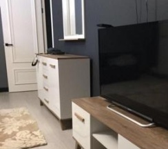 2-комнатные апартаменты стандарт с 1 двуспальной кроватью и диваном в Apart Ru Hotel