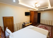 Четырёхместный люкс с 2 комнатами в Salut Hotel Almaty