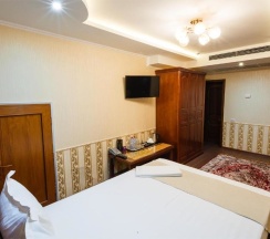 Четырёхместный люкс Двухкомнатный в Salut Hotel Almaty