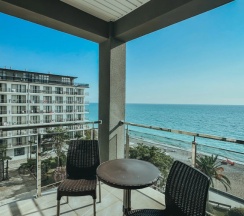 Двухместный полулюкс с видом на море двуспальная кровать в Нарт