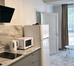 Апартаменты двухкомнатные четырехместные  (улучшенные) с балконом в Polikariya