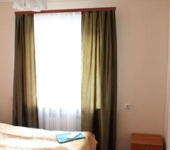Номер стандарт семейный с 1 двуспальной кроватью в Регион 86