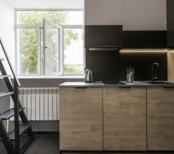 Двухуровневая студия с двуспальной кроватью и диваном в Greenfeel Smolensk
