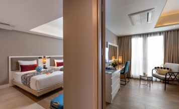 Четырёхместный семейный номер Deluxe с видом на город в Отель Woovo Phuket Patong