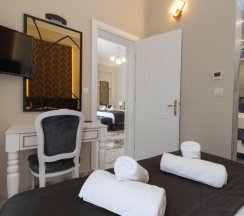 Семейный люкс Deluxe в Modern Luxury Hotel