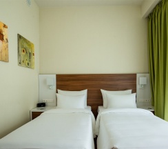 Однокомнатный номер с двумя отдельными кроватями в СберУниверситет