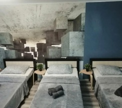 Четырёхместные апартаменты c 1 комнатой с балконом в Квартира Калина на Заводской 4
