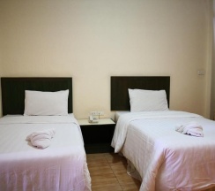 Двухместный номер Standard 2 отдельные кровати в Baan Suksiri Hotel