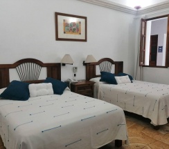 Четырёхместный номер Standard 2 отдельные кровати в Hotel Aitana Oaxaca