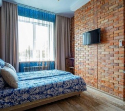 Комната люкс с 1 двуспальной кроватью и дополнительным местом в Руднев
