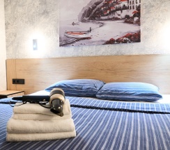 Двухместный номер КОМФОРТ с большой двуспальной кроватью или двумя односпальными кроватями в Морской