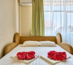 Двухместный люкс с 2 комнатами с балконом 2 отдельные кровати в Аист