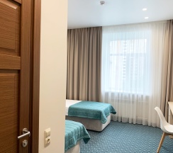 Номер стандарт улучшенный с 2 односпальными кроватями в Хабаровск