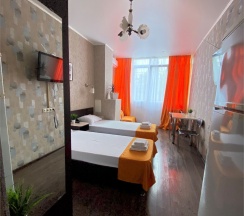 Трехместный номер с кухонной зоной в Joy apartments