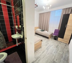 Номер стандарт с 2 односпальными кроватями (цокольный этаж) в Kovensky